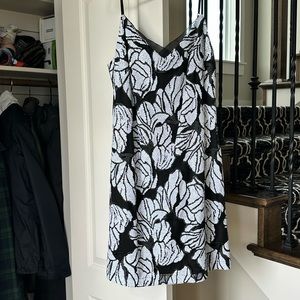 Brand New. Black and white sequined spaghetti strap shift dress